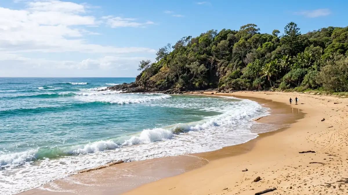 Agnes Water Main Beach with surfing waves, Queensland's northernmost surf beach
