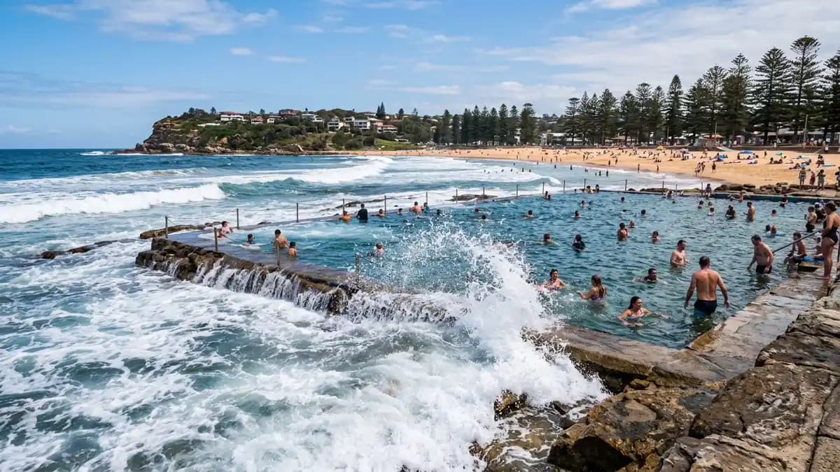 Dee Why ocean rock pool with waves crashing over the edge, Northern Beaches Sydney