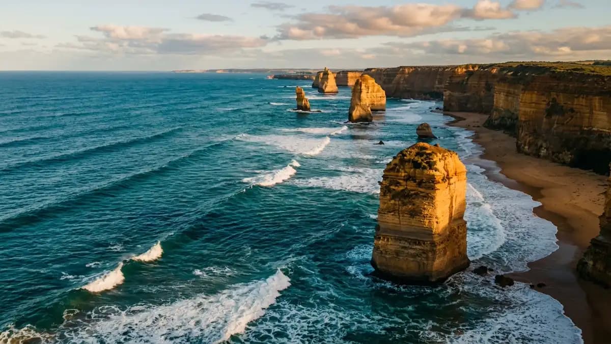 Twelve Apostles limestone sea stacks at sunset Great Ocean Road Victoria