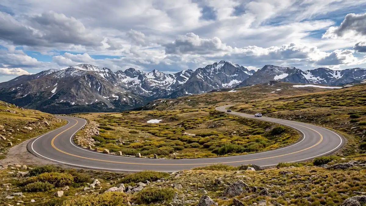 Trail Ridge Road curving through alpine tundra above treeline at Rocky Mountain National Park