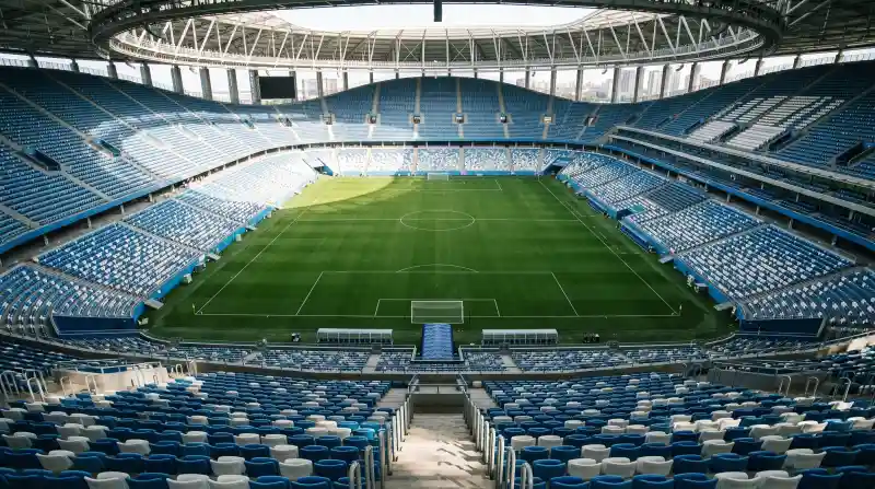 Inside Accor Stadium looking down at the pitch from the upper stands during a stadium tour