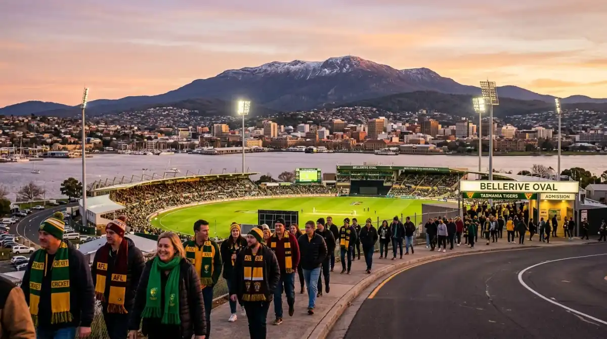 Blundstone Arena at golden hour with kunanyi Mount Wellington backdrop and fans walking along Derwent Street toward the ground