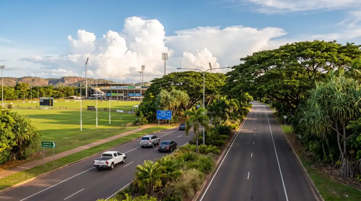 Abala Road Marrara approach to TIO Stadium lined with tropical trees and lush vegetation in Darwin Northern Territory